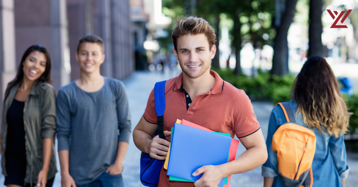 Students walking with backpacks and notebooks